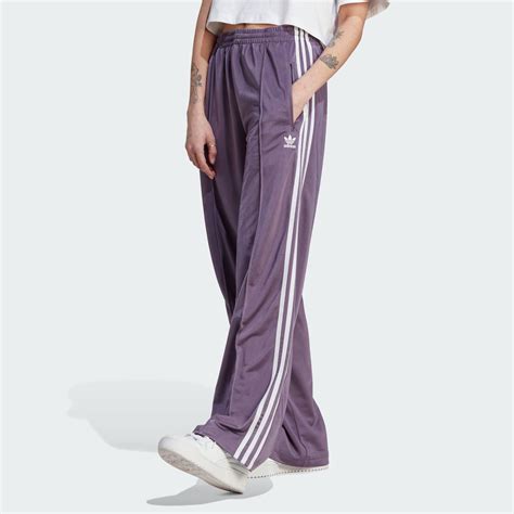 adidas losse hardloopbroek|Adidas loose track trousers.